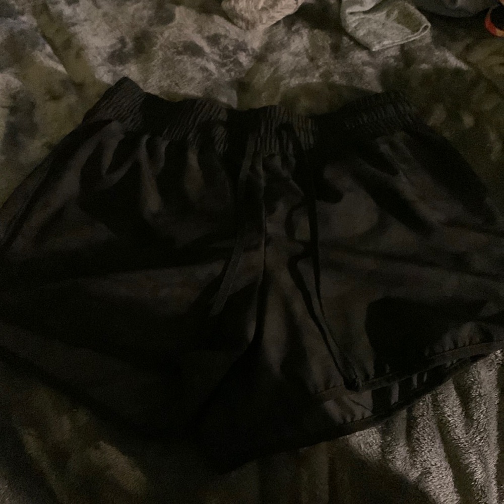 black shorts with a camp design has never been worn